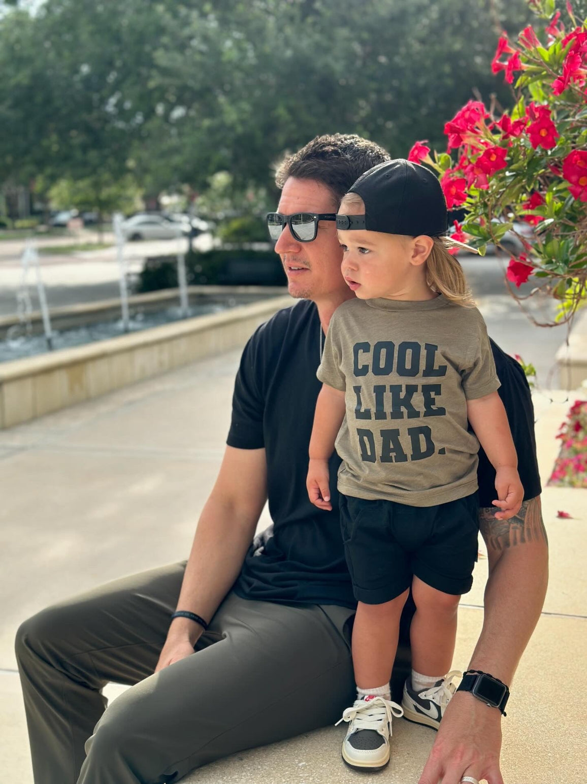 Model Wearing SBG Co. Cool Like Dad Black On Green Tee