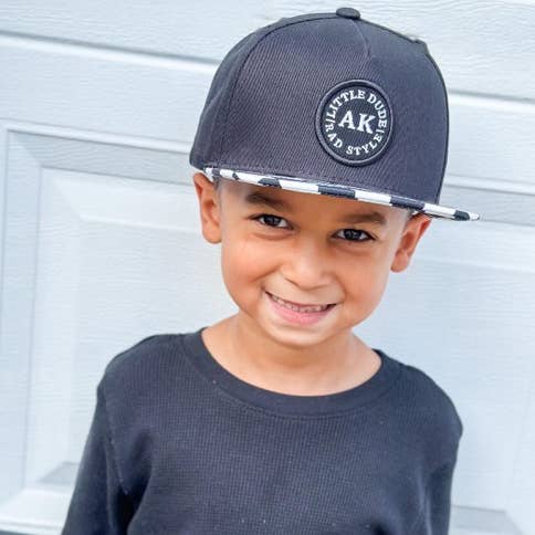 Model Wearing AK Clothing Co. Ak Original Snapback - Black & White Checker