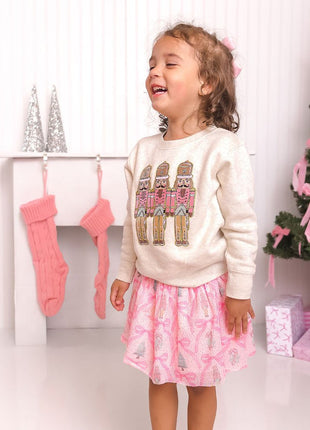 Model Wearing Sweet Winks Pastel Nutcracker Patch Christmas Sweatshirt - Natural