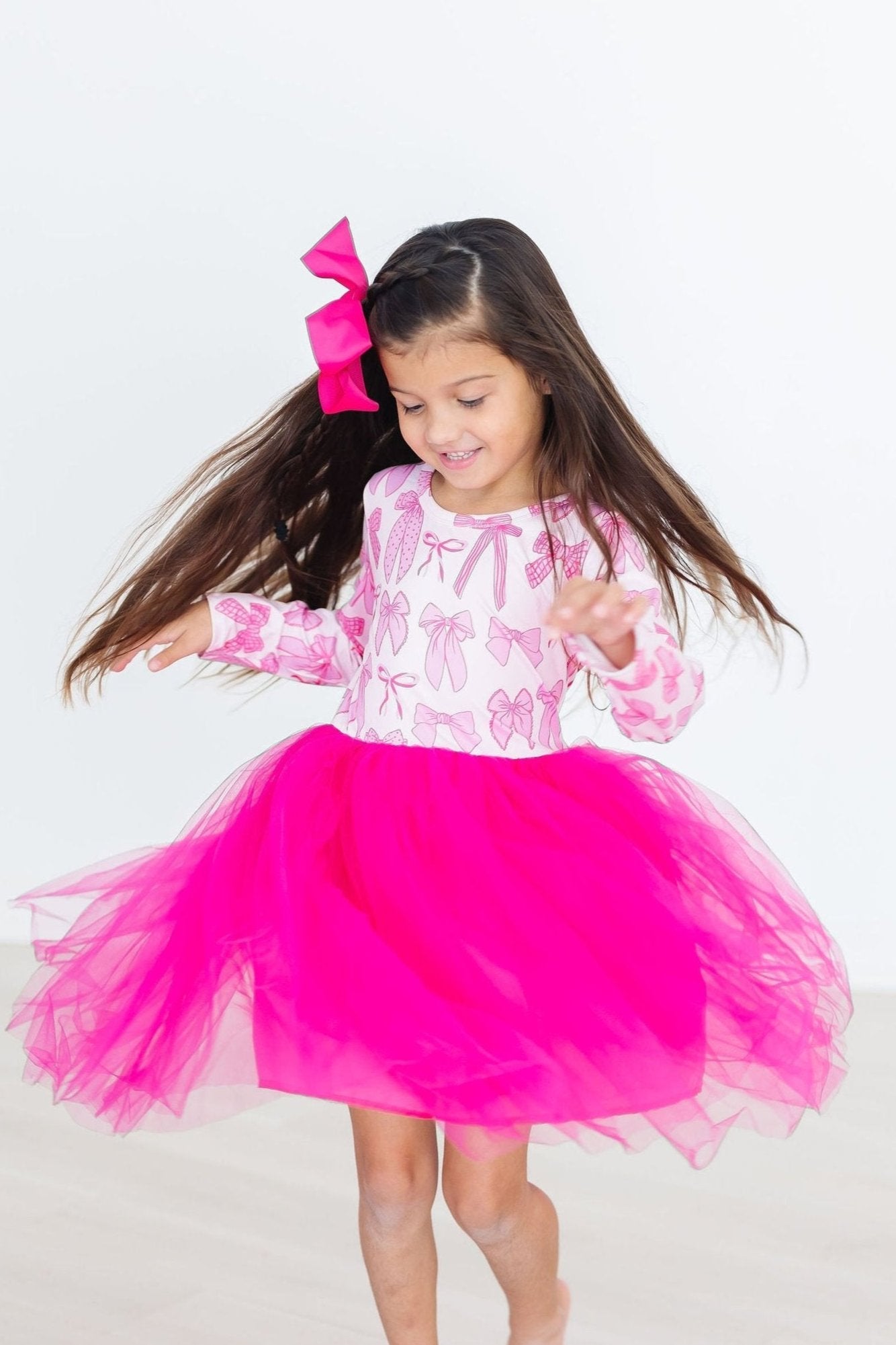 Model Wearing Mila & Rose Pretty in Pink Long Sleeve Tutu Dress