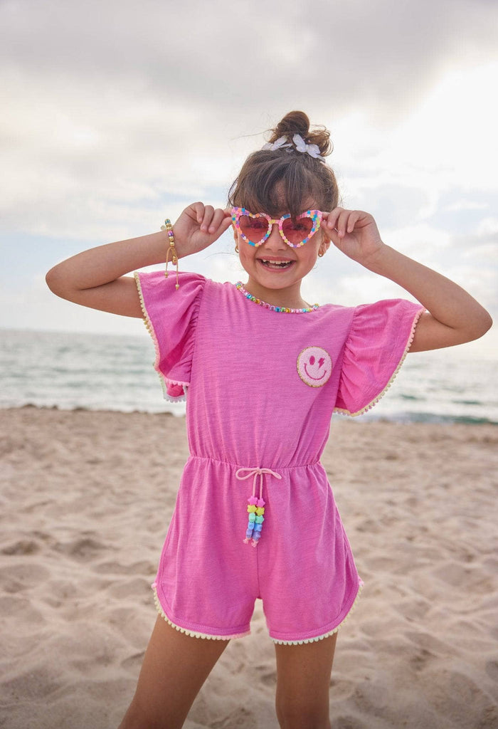 Model Wearing Lola And The Boys Pink Gems Emoji Romper