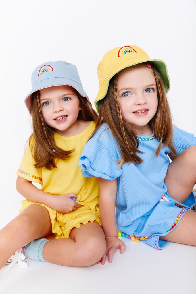 Models Wearing Lola and The Boys Rainbow Reversible Bucket Hat