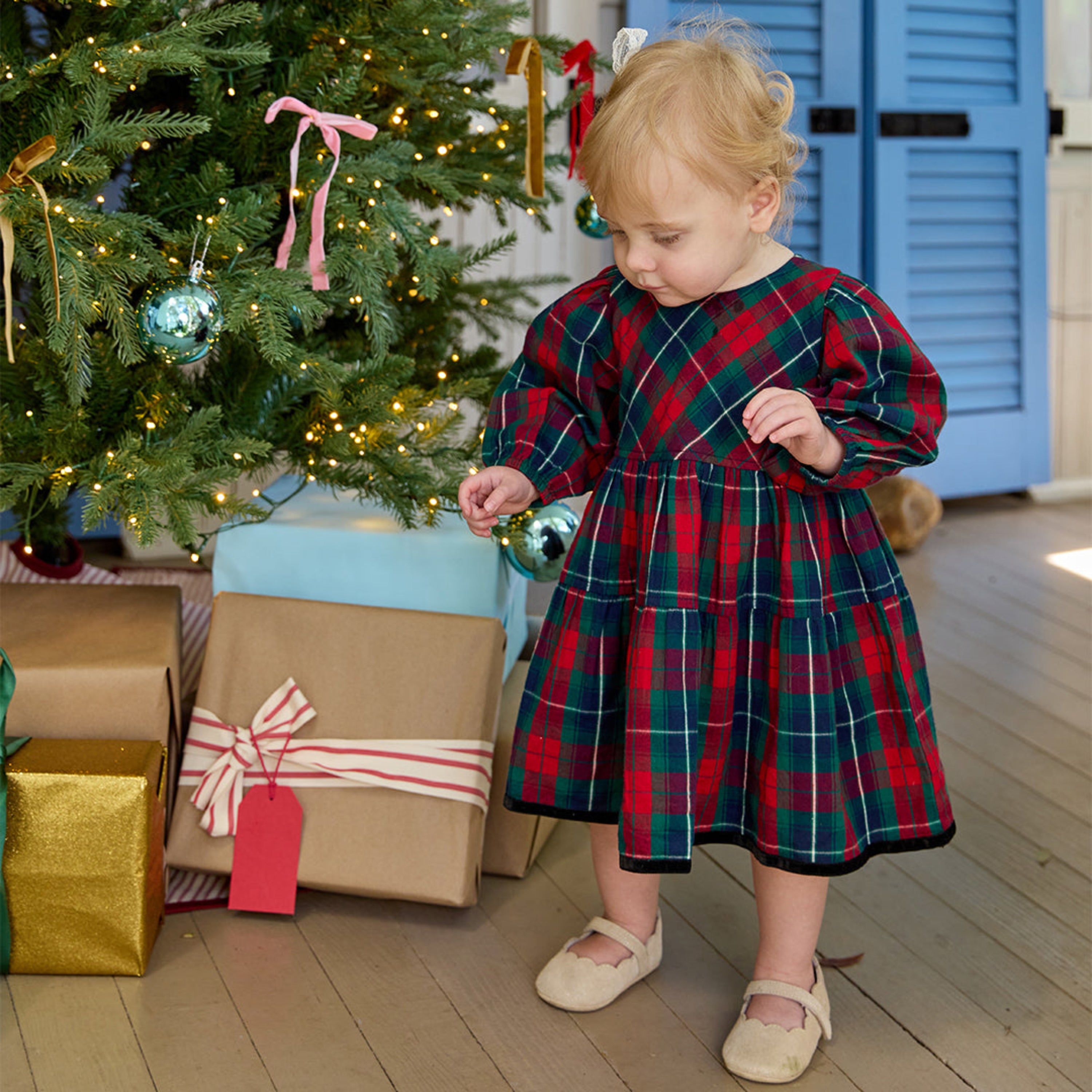 Model Wearing Pink Chicken Baby Girls Maribelle Dress Set - Red Tartan