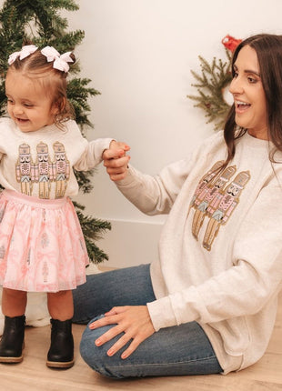 Mommy & Me Models Wearing Sweet Winks Pastel Nutcracker Patch Christmas Sweatshirt - Natural