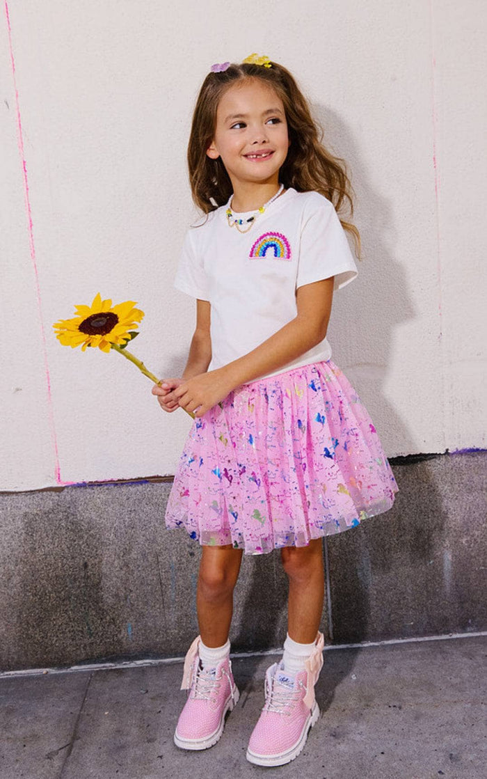Model Wearing Lola And The Boys Rainbow Daily Reminders T-shirt