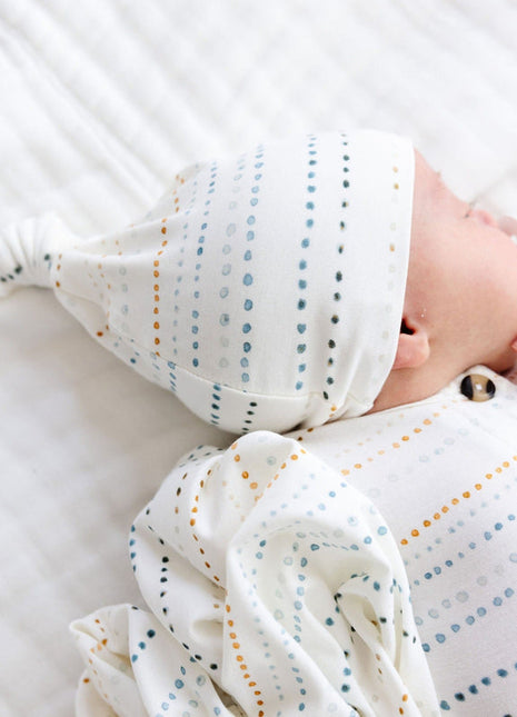 Model Wearing Lou Lou & Company Conrad Top Knot Hat