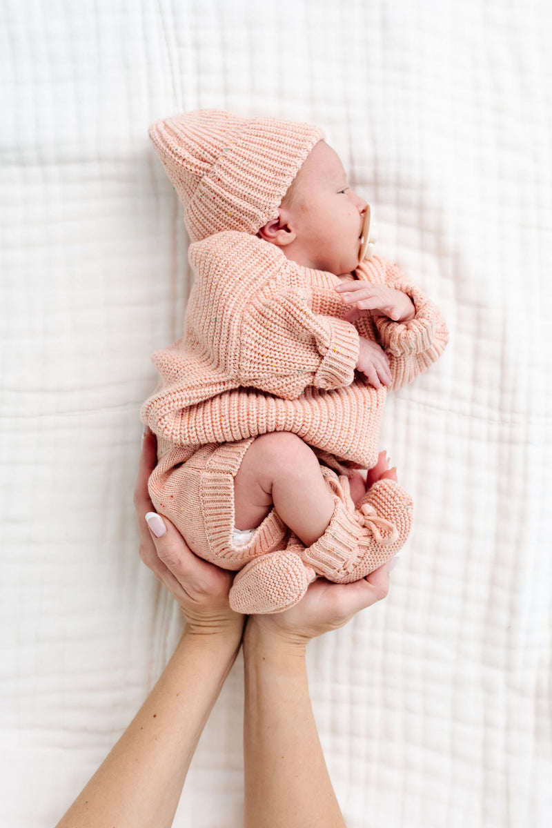Model Wearing Lou Lou & Company Knit Booties - Petal Speckle