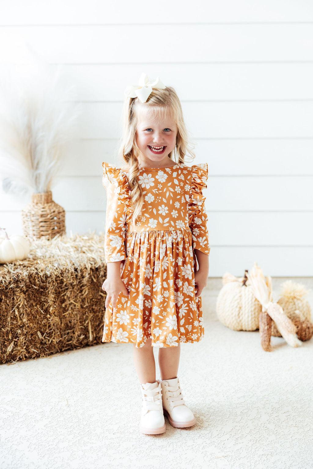 Model Wearing Mila & Rose Golden Blooms 3/4 Sleeve Ruffle Twirl Dress
