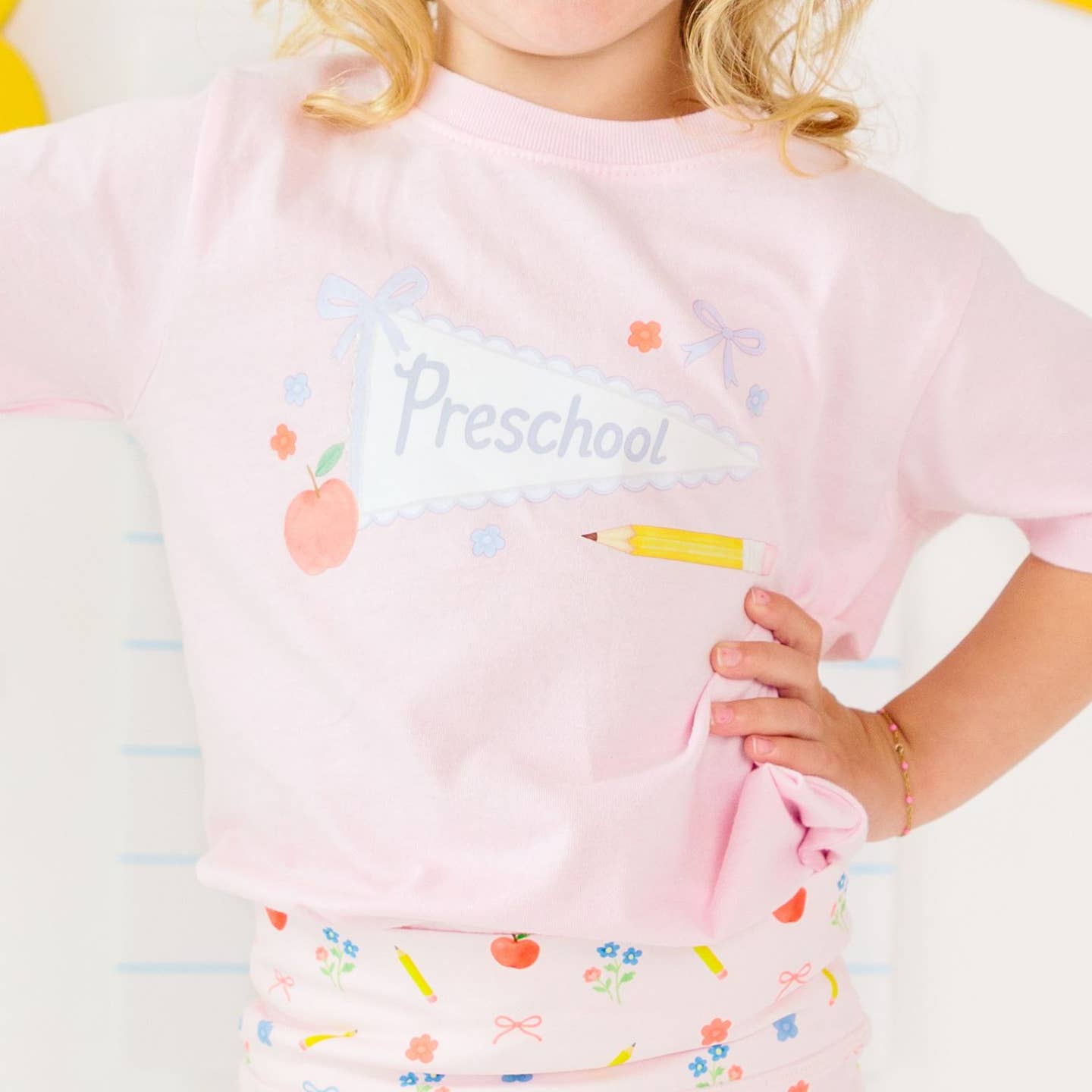 Model Wearing Sweet Wink Preschool Bow Pennant Short Sleeve T-Shirt - Back To School