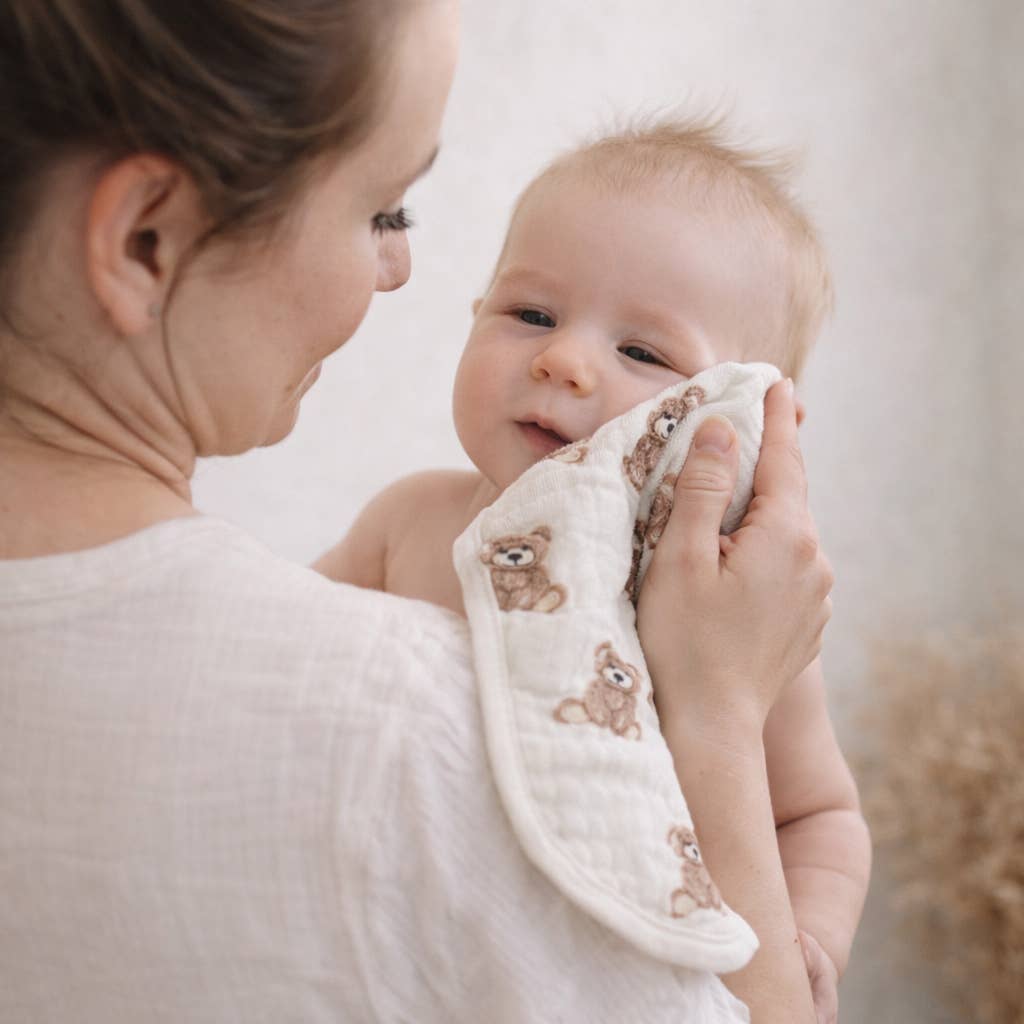 Model Using Ali + Oli Bamboo Muslin Burp Cloth Set 2-Pack (Teddy/Taupe)