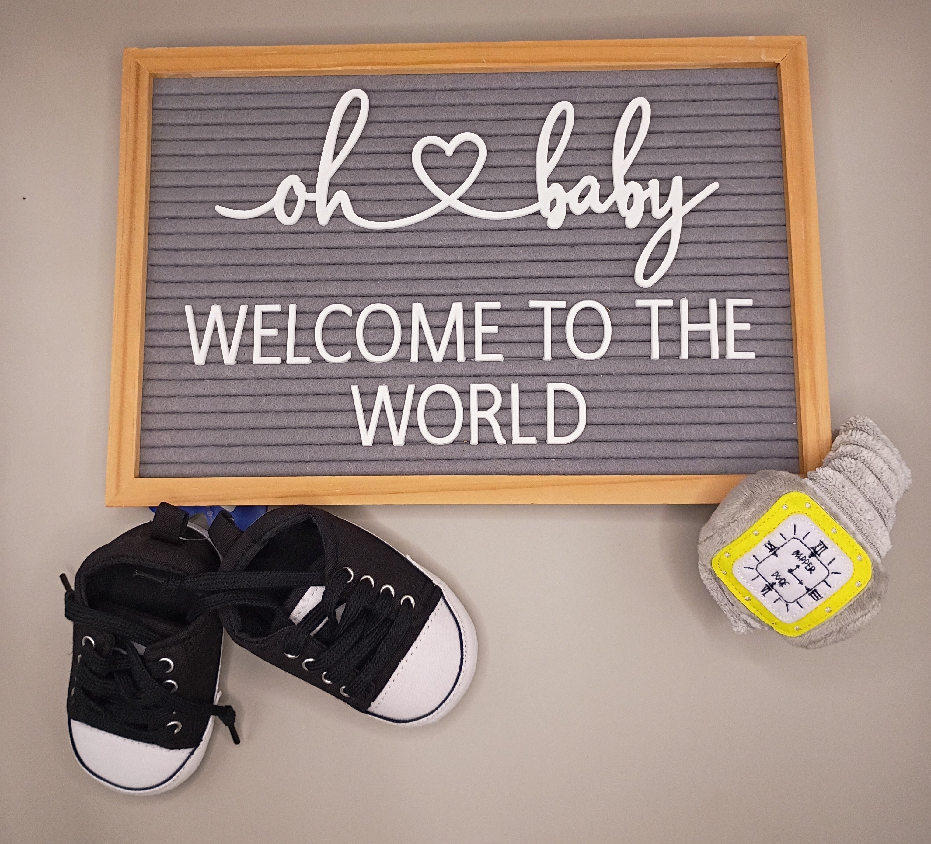 "Welcome To The World" Sign
