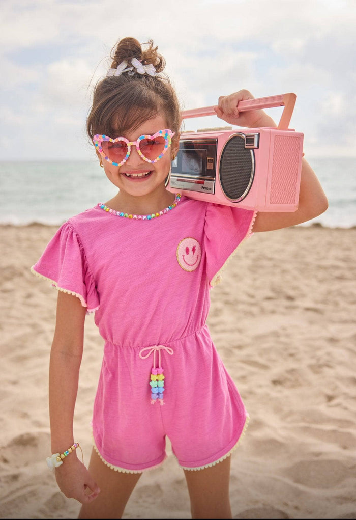 Model Wearing Lola And The Boys Pink Gems Emoji Romper
