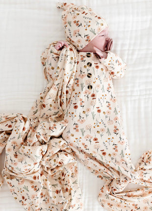 Model Wearing Lou Lou & Company Rachel Knotted Gown, Top Knot Hat, and Swaddle Blanket 