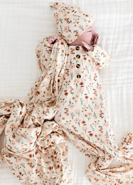 Model Wearing Lou Lou & Company Rachel Knotted Gown, Top Knot Hat, and Swaddle Blanket 