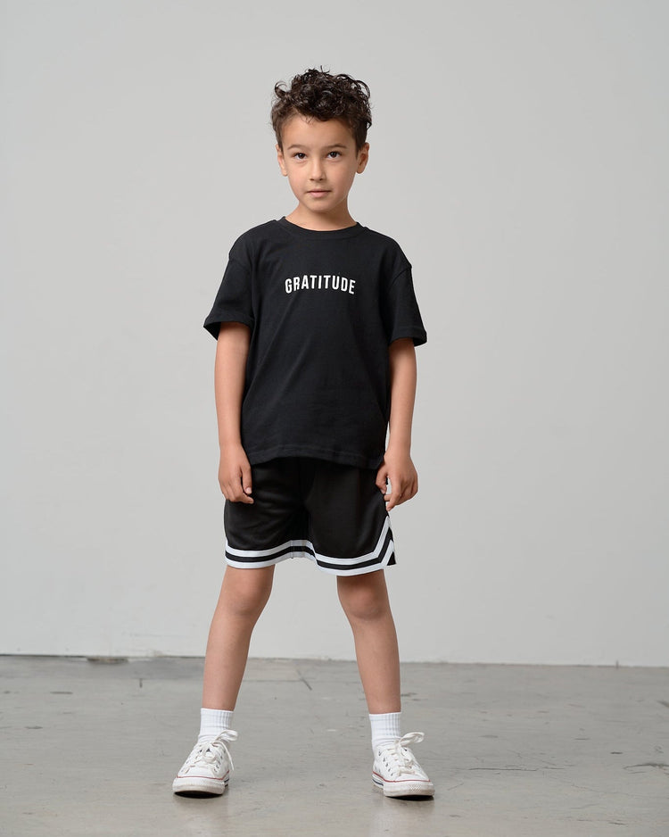 Model Wearing Little Bipsy Varsity Mesh Short - Black