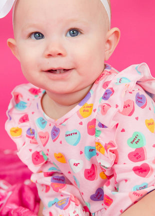 Model Wearing Rufflebutts + Ruggedbutts Baby Girls Be My Valentine Knit Long Sleeve Waterfall Bubble Romper