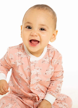 Model Wearing Magnetic Me cherry blossom modal magnetic fuss free coverall