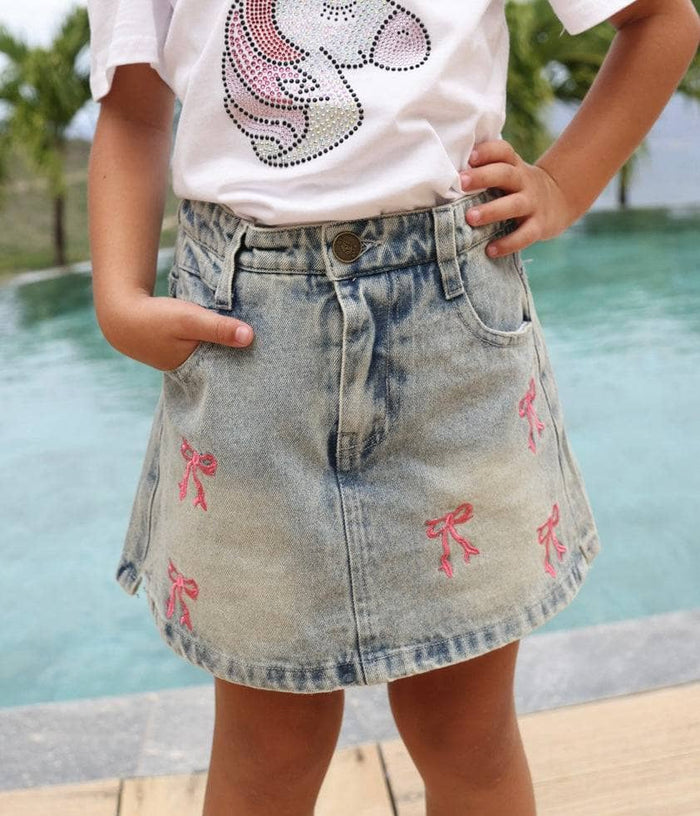 Model Wearing Lola And The Boys Cutie Bows Denim Skirt