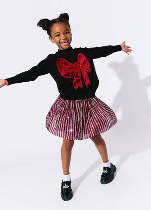 Model Wearing Lola And The Boys Big Bow Sweater