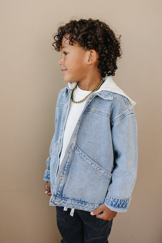 Model Wearing Olive + Scout Briggs Denim Jacket