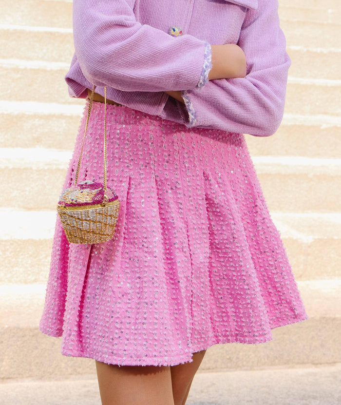 Model Wearing Lola And The Boys Pink Denim Sparkle Pleated Skirt