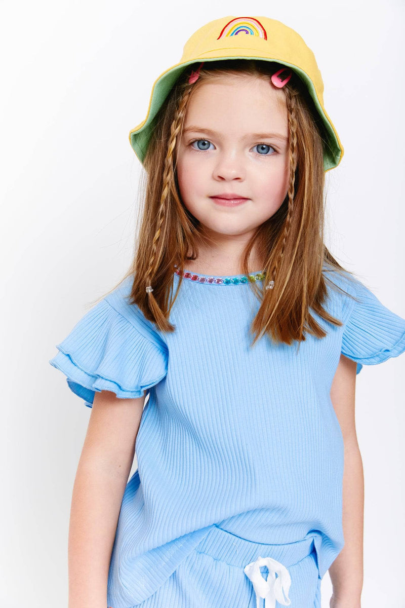 Model Wearing Lola and The Boys Rainbow Reversible Bucket Hat