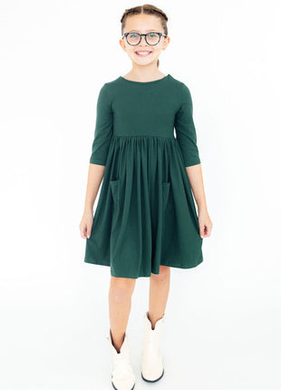 Model Wearing Mila & Rose Spruce 3/4 Sleeve Pocket Twirl Dress