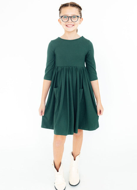Model Wearing Mila & Rose Spruce 3/4 Sleeve Pocket Twirl Dress