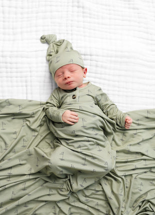 Model Wearing Lou Lou & Company Cal Swaddle Blanket & Knotted Hat