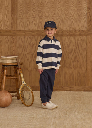 Model Wearing Rylee & Cru Rugby Polo || Navy Stripe