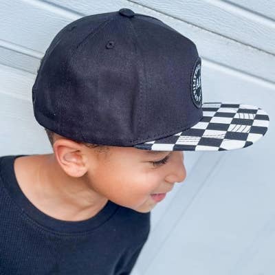 Model Wearing AK Clothing Co. Ak Original Snapback - Black & White Checker
