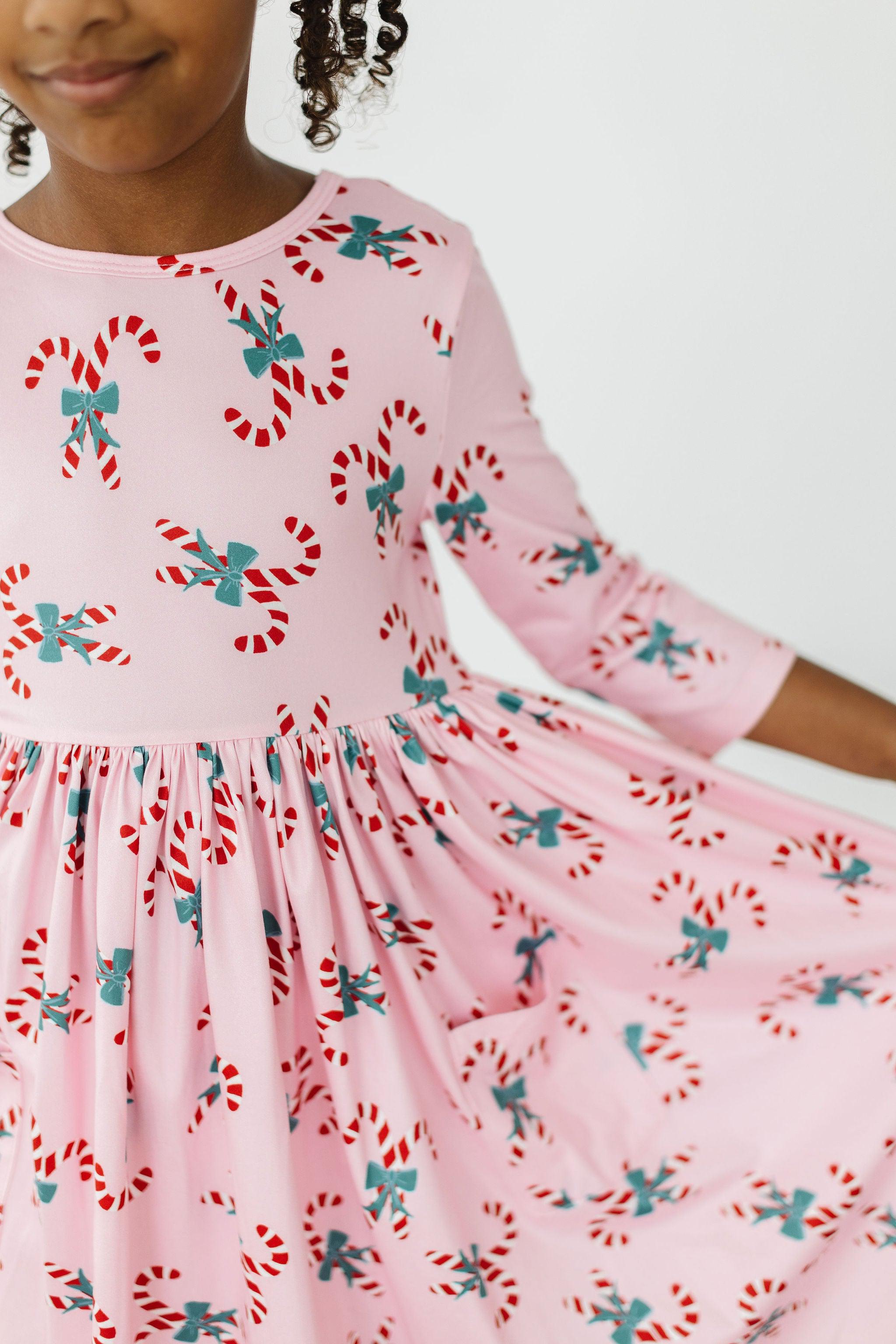 Model Wearing Mila & Rose Candy Cane Cutie 3/4 Sleeve Pocket Twirl Dress