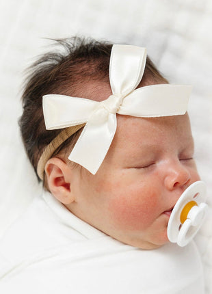 Model Wearing Lou Lou & Company Satin Bow - Cream Headband