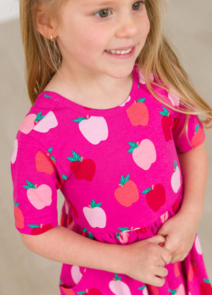 Model Wearing Rufflebutts+ Ruggedbutts Girls Apple of My Eye Short Sleeve Knit Twirl Dress