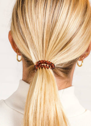 Model Wearing Teleties Spiral Hair Coils | Small | Tortoise Hair Ties