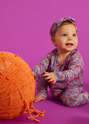 Model Wearing Magnetic Me Gilded Lily Magnetic Convertible Coverall