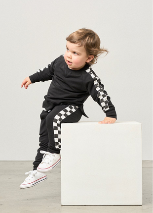 Model Wearing Little Bipsy Side Checkered Pullover - Black