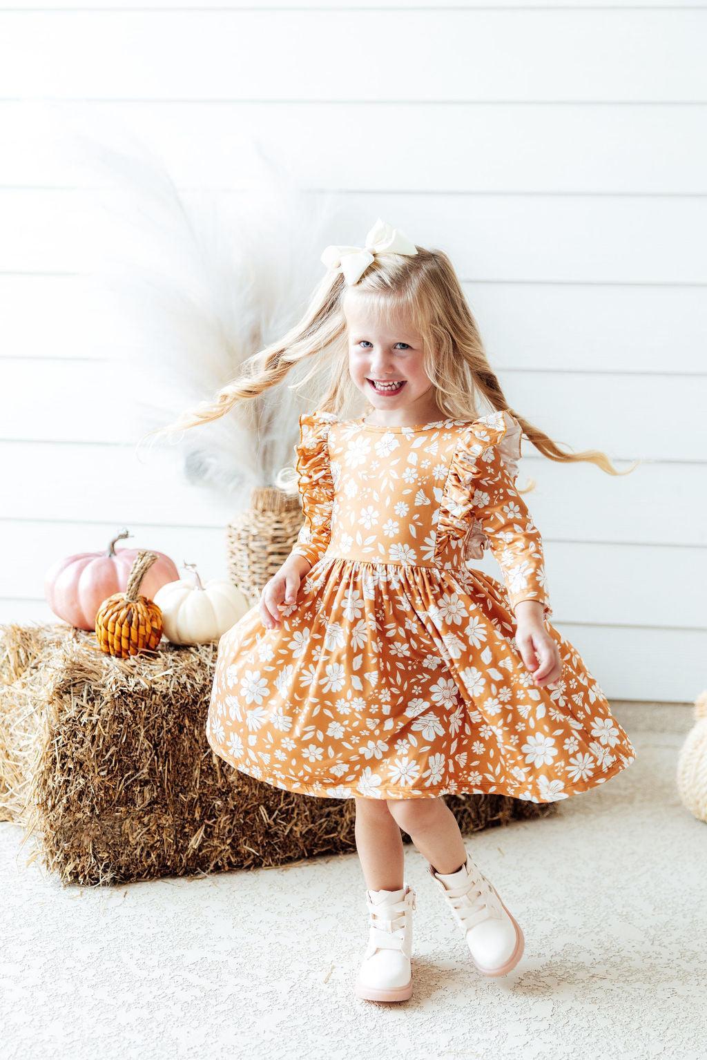 Model Wearing Mila & Rose Golden Blooms 3/4 Sleeve Ruffle Twirl Dress