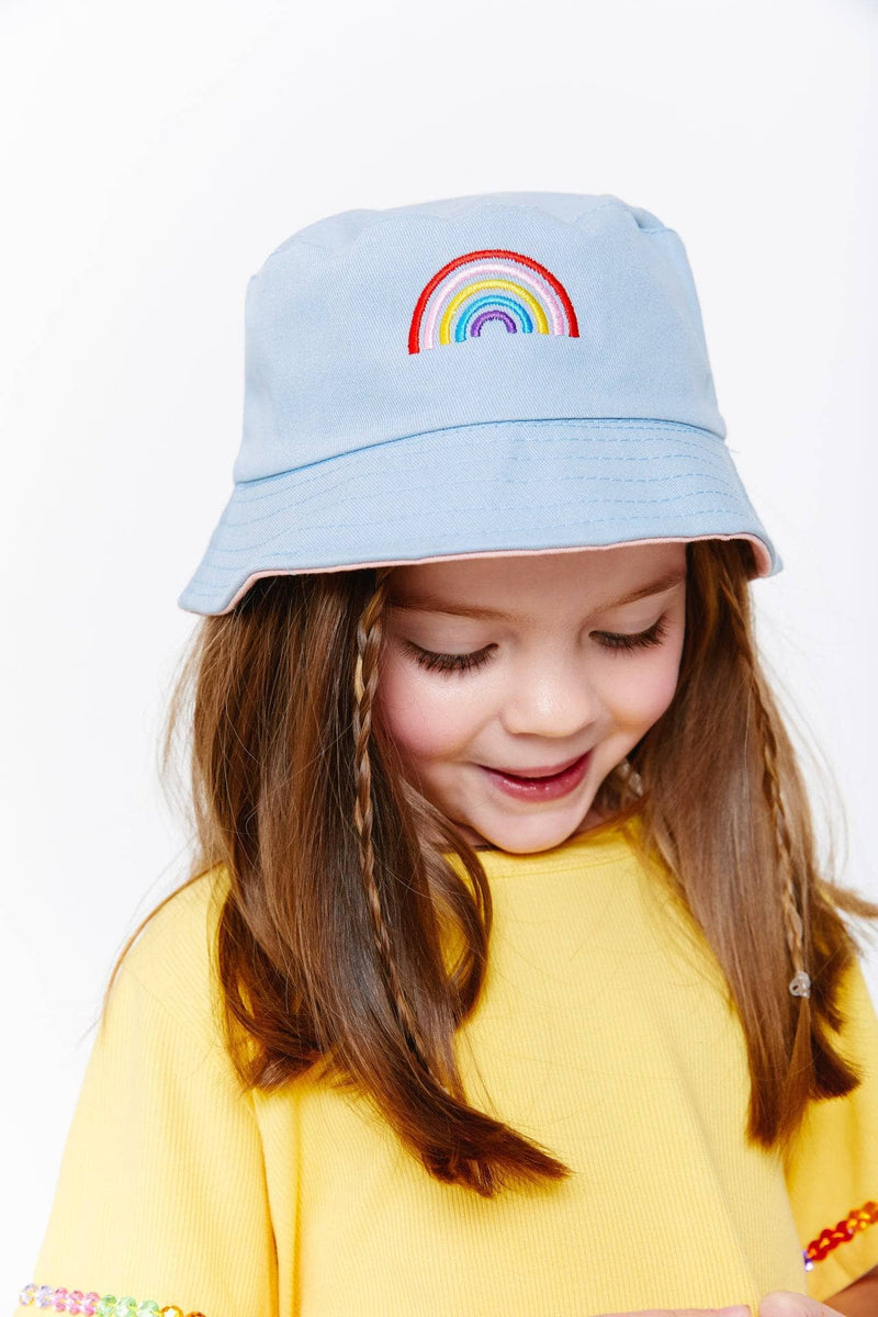 Model Wearing Lola and The Boys Rainbow Reversible Bucket Hat