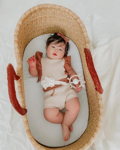 Model Using Ali + Oli Giraffe Teether & Rattle Food-Grade Silicone Toy (Taupe)