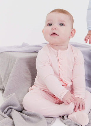 Model Wearing Magnetic Me Pin Dot Pink Modal Magnetic Footie with Ruffle