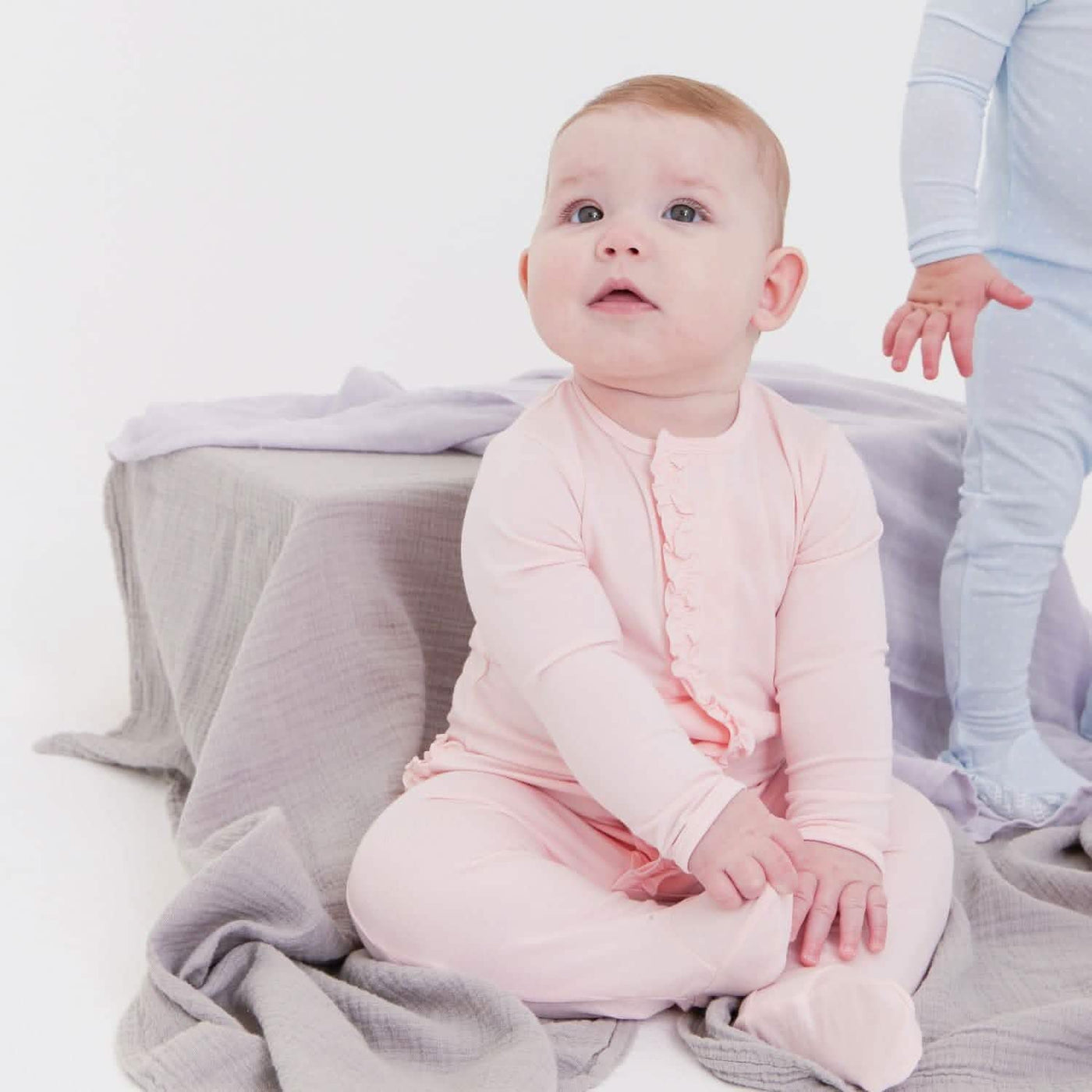 Model Wearing Magnetic Me Pin Dot Pink Modal Magnetic Footie with Ruffle