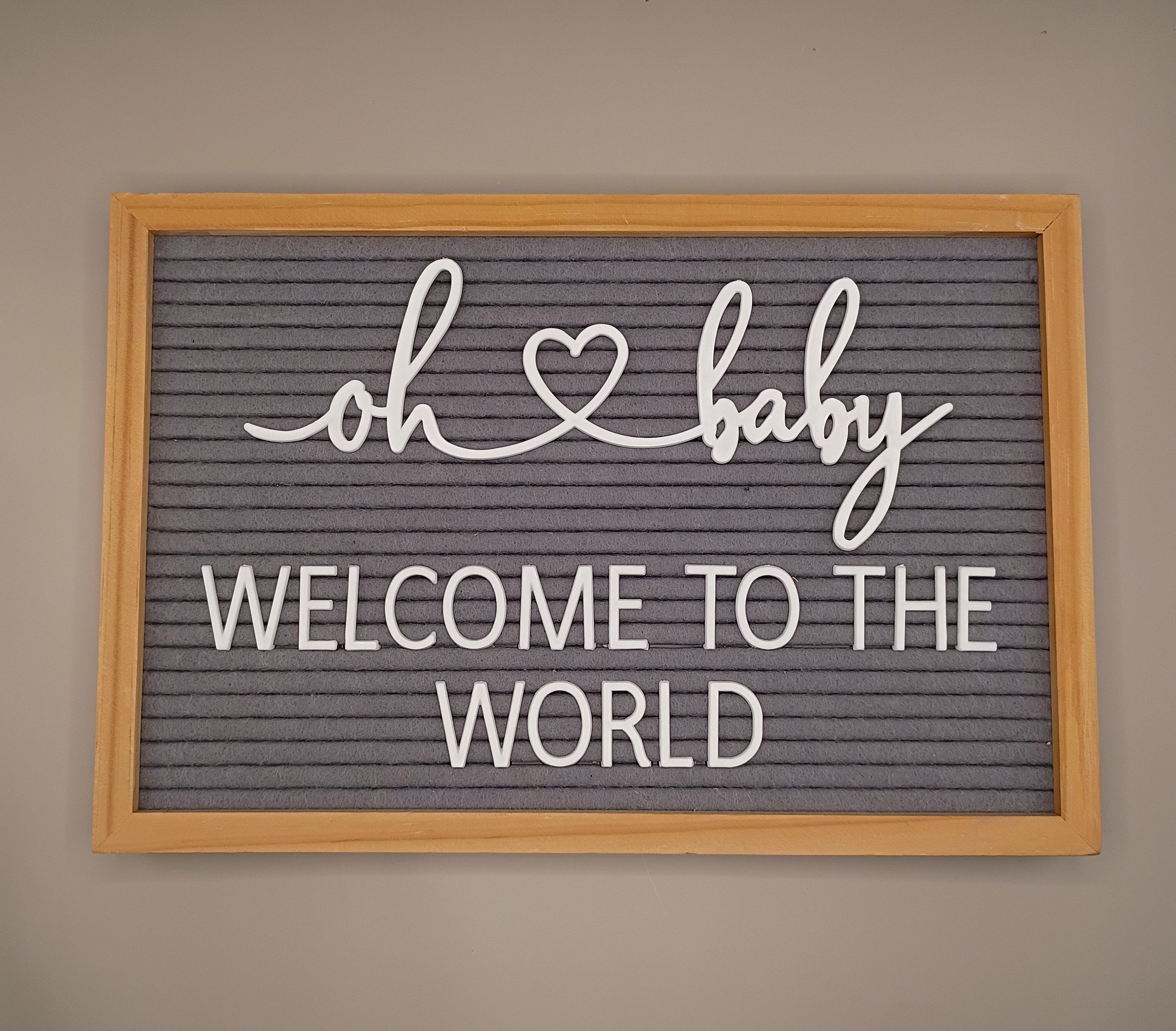 "Welcome To The World" Sign