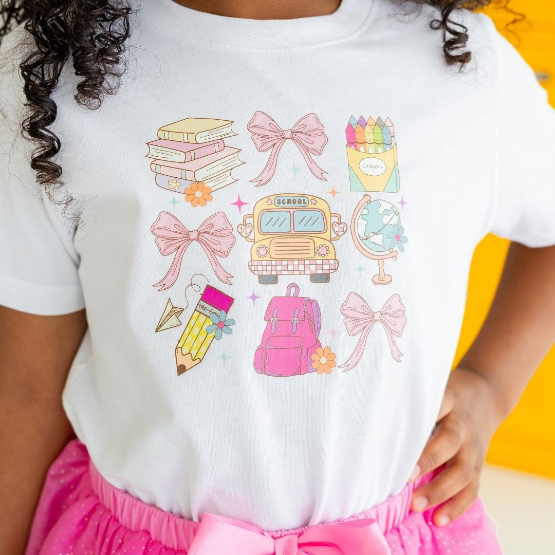 Model Wearing Sweet Wink Coquette School Doodle Short Sleeve T-Shirt - White