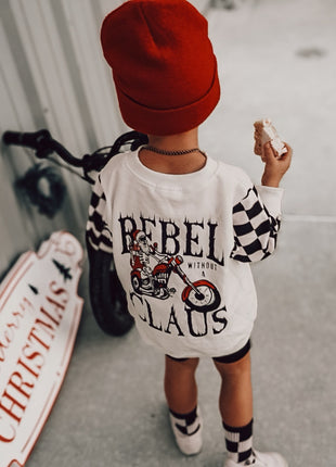 Model Wearing Ak Clothing Co. Rebel Without A Claus-Crewneck Kids