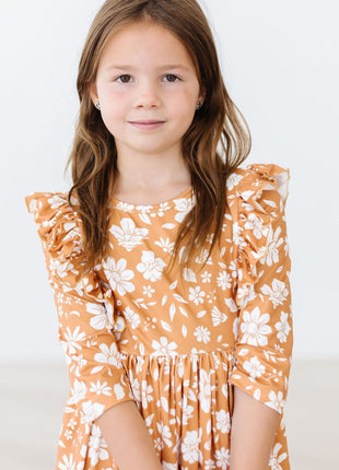 Model Wearing Mila & Rose Golden Blooms 3/4 Sleeve Ruffle Twirl Dress