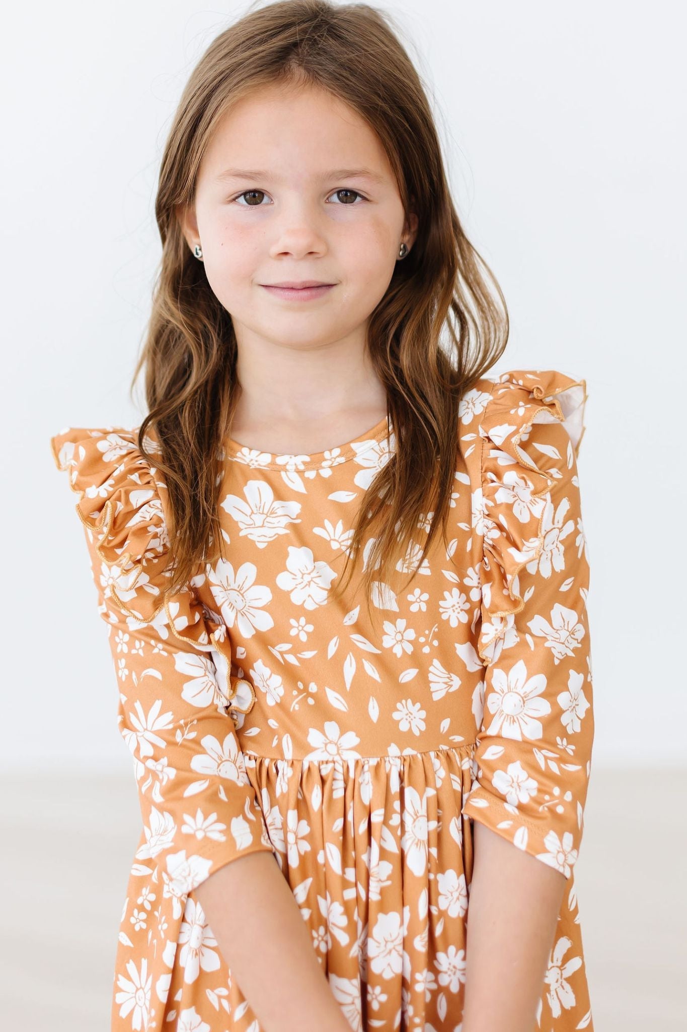 Model Wearing Mila & Rose Golden Blooms 3/4 Sleeve Ruffle Twirl Dress