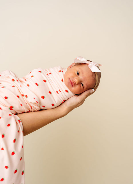 Model Wearing Lou Lou & Company Junie Swaddle Blanket