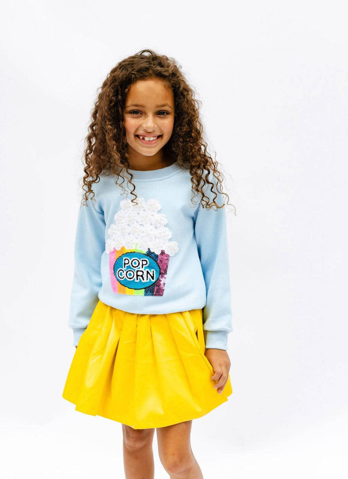 Model Wearing Lola And The Boys Pearls and Popcorn Sweatshirt