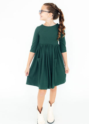 Model Wearing Mila & Rose Spruce 3/4 Sleeve Pocket Twirl Dress